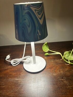 Table lamp  it has 3 settings you charge it